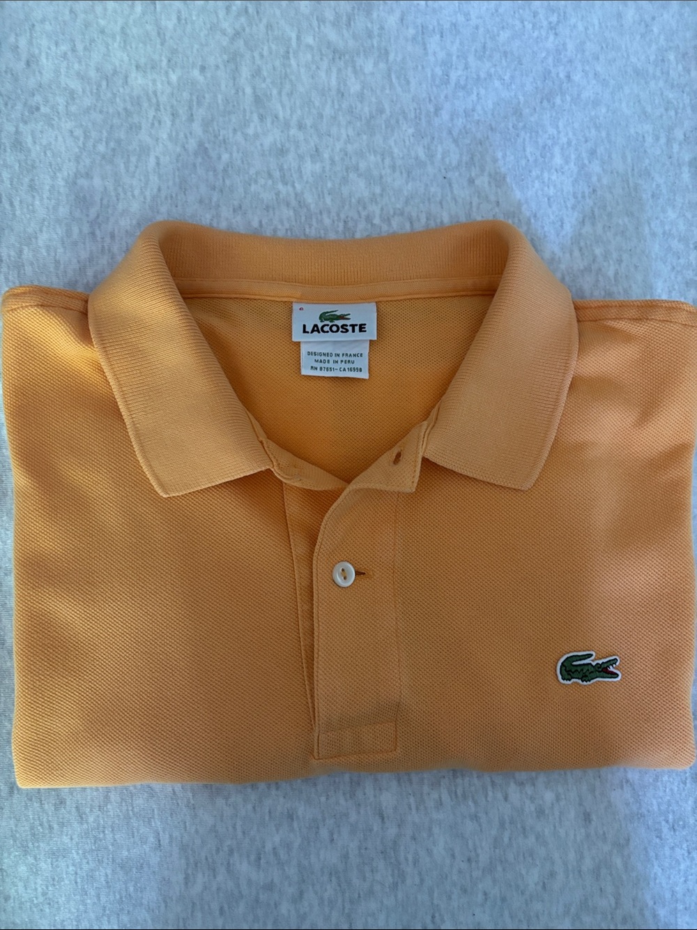 Lacoste Men's Polo in Warm Orange with Crocodile Logo